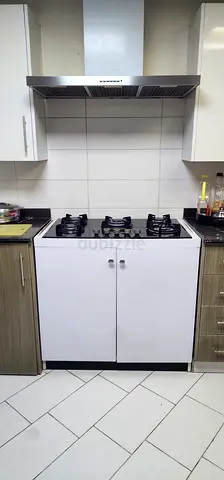 Five burner Gas hob with joint cabinet for utensils storage for sale