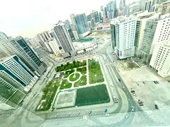 Open View 2BHK parking gym pool Maintenance free rent 50k 6cheque payment front of al nahda