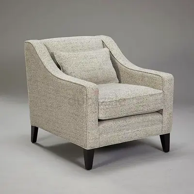 Light grey upholstered accent armchair with wooden legs