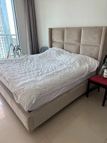 Light beige upholstered queen bed frame with padded headboard - Bought from Sapsa Bedding