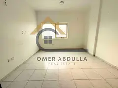 LAVISH BIG SIZE 1BHK ON ROAD BUILDING IN MUWAILEH