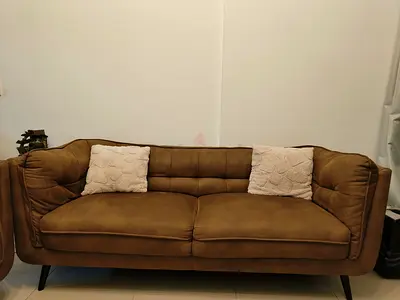 Brown 3-seater leather-look sofa in good condition