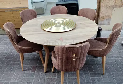 Round wooden dining table with 6 velvet upholstered chairs (set)