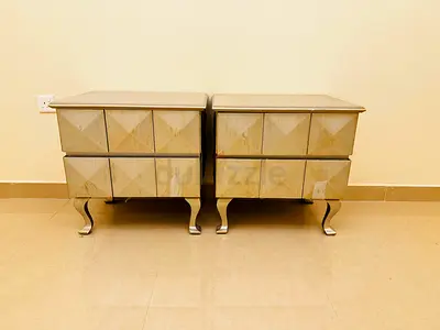 Pair of bedside cabinets with decorative drawers