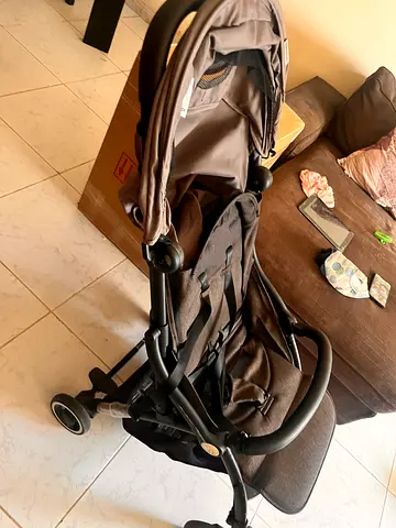 Lightweight grey stroller in good condition, single seat with canopy