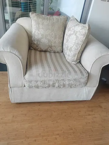 Beige Fabric Armchair  and 2 seater and 3 seater sofas with Cushions, glass center table