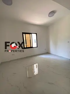 Annual studio for rent in Ajman, Al Rumaila 1. Brand-new building, first tenant, separate kitchen, A