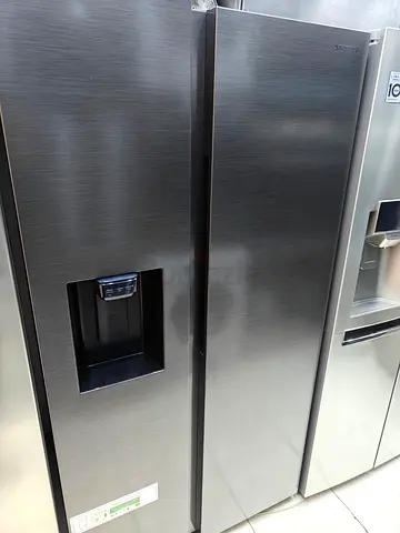 Samsung brand side by side Fridge freezer with water Dispenser and ice maker
