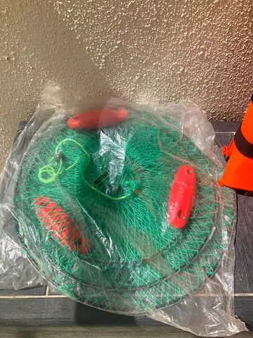 Urgent - Small foldable fishing net with floats - unused