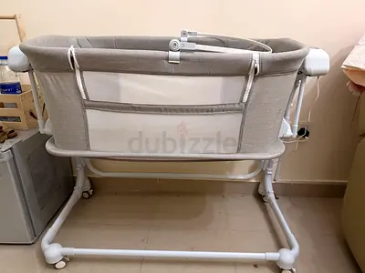 Baby Bassinet or cradle swing ( automatic) with baby mat and bed