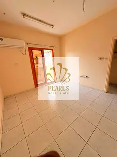 Annual Rent in Al Nuaimiya 1 Ajman: 1BR Apartment with Open View Balcony, Split AC, and Full Mainten