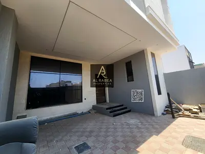 Modern townhouse in Al Zahya, Ajman featuring 3 master bedrooms, spacious living room, contemporary