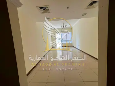 The best two-bedroom apartment with a full terrace and open view in a prime location in Al Qasimia, Sharjah, for annual rent.