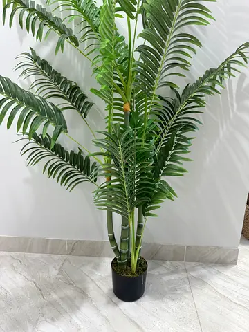 Tall artificial palm plant in black pot - good condition