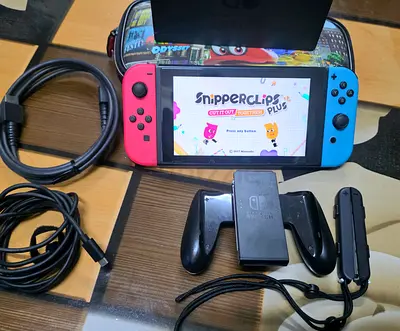 NINTENDO SWITCH +1 GAMES WITH BAG