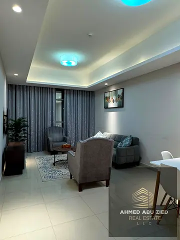 Luxury 1BHK fully furnished for annual rent in Gulfa Towers, master bedroom, laundry room, built-in wardrobes, balcony, open view, luxury finishes.