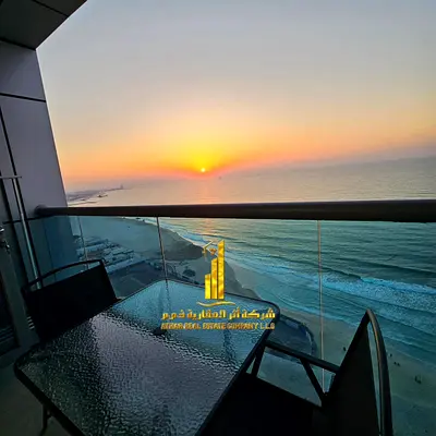 Two-bedroom apartment with a living room, fully furnished with new furniture, available for monthly rent in Ajman - Corniche - Residence Towers.