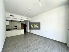 1BR Apartment | Belgravia Square | Downtown City View | Balcony