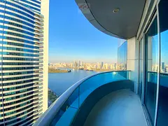 LUXURIOUS 2BHK WITH LAKE VIEW IN BLUE TOWER SHARJAH - DIRECT F.ROM OWNER CHILLER FREE.