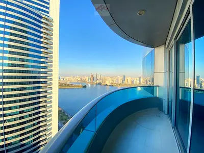 LUXURIOUS 2BHK WITH LAKE VIEW IN BLUE TOWER SHARJAH - DIRECT F.ROM OWNER CHILLER FREE.