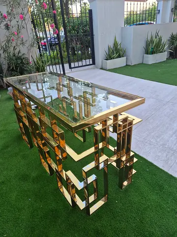 Excellent condition customized gold console table for sale aed 699