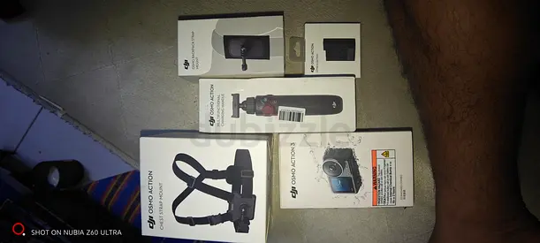 DJI Osmo Action 3 + Accessories (mounts, chest strap, grip) -