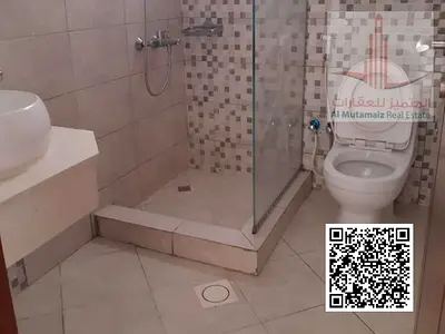 One bedroom and living room for rent in a new building, excellent location (Al Safa 2)