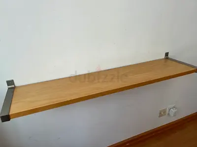 Shelf with brackets