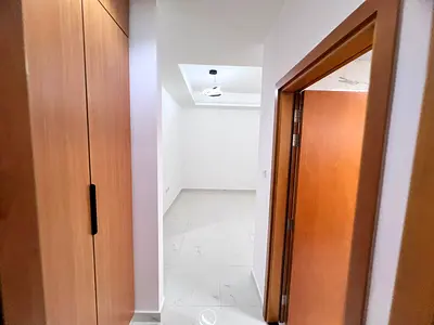 One bedroom and living room, master bedroom with balcony and view, built-in wardrobes, high-end finishes, fully lit apartment