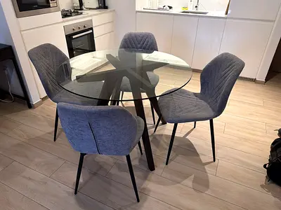 Glass dining table with chairs