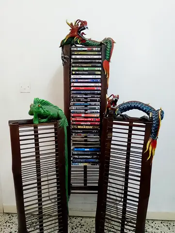 Collection of DVDs with 3 decorative wooden rack (about 30 discs)