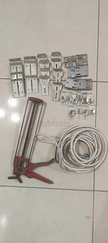 Assorted Hardware Tools and Curtain Brackets Collection