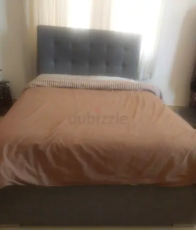 Grey upholstered double bed frame with headboard without mattress - good condition