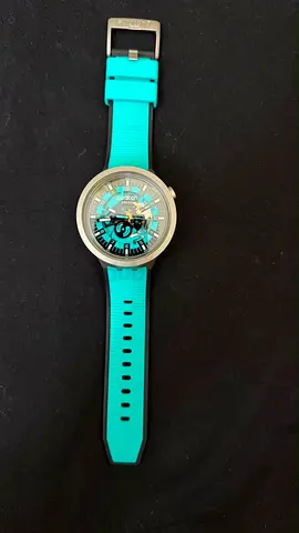 Turquoise men's mechanical-style watch with silicone strap