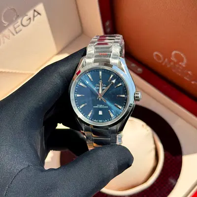 +2 This appears to be an Omega Seamaster Aqua Terra watch, specifically a 38mm "S