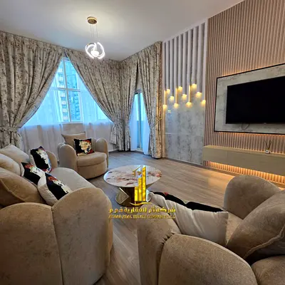 Luxury one-bedroom apartment in Ajman - Al Rashidiya 3 - Ajman One Towers - fully furnished with new furniture, available for monthly rent.