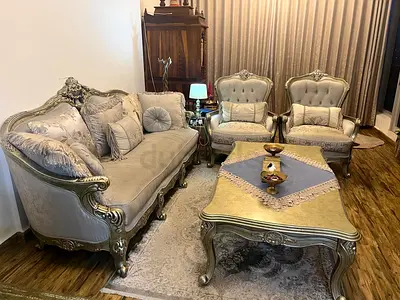 Antique-style 3-piece living room set with carved wood and upholstery with table and carpet