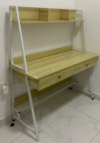 Study table with attached shelf and drawers