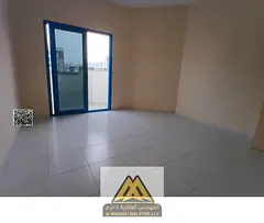 Annual Rent: Spacious 1-bedroom apartment in Al Hamidiya 1, balcony, open view, central AC, prime lo