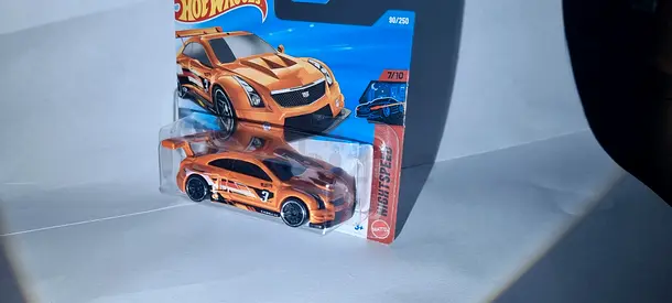 Hot Wheels 1/64 Cadillac CTS-V Hotshot orange diecast car (new in package)