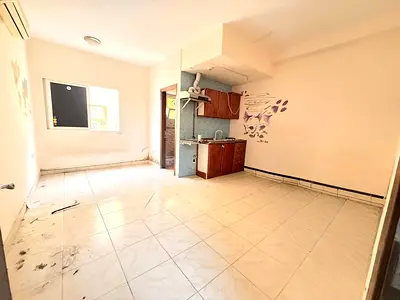 CHEAP PRICE BIG STUDIO ON ROAD BUILDING IN MUWAILEH