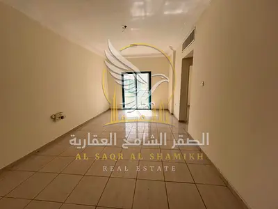 The largest two-bedroom apartment with central AC, modern and elegant finishing, in a prime and vibrant location in Al Qasimia, Sharjah, for annual re