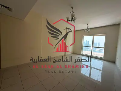 اطلالة بحرية باركن + جيم ومسبح وكيدز اريا اجمل غرفتين وصالة مع غرفة خدامة + خزائن بالحائط تشطيب ممتاز للايجار في الخان