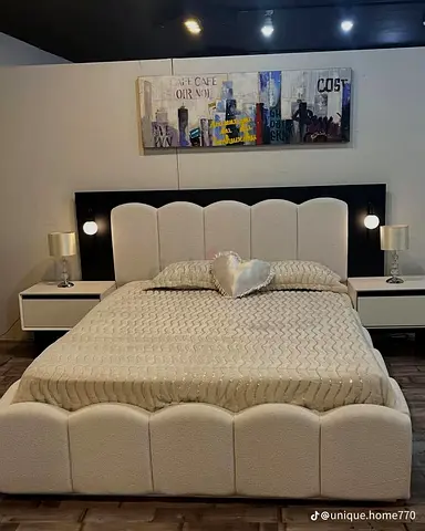 Modern upholstered king-size bed with matching nightstands