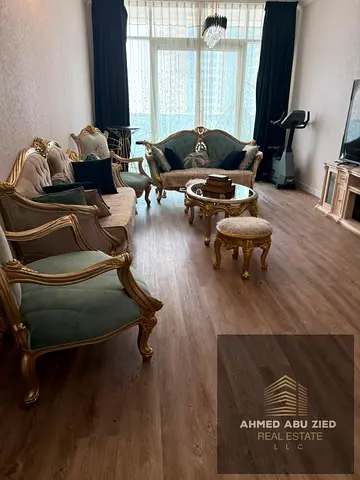 Luxury 2BHK, fully furnished living room in Oasis Towers - Ajman, luxury finishes, 3 bathrooms, balcony, open view, spacious, parking + gym + pool.