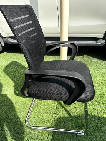 Black mesh study/ office chair with chrome cantilever frame