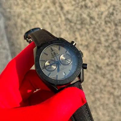 The selected item is an Omega Speedmaster Dark Side of the Moon "Black Black" chronograph with a bla