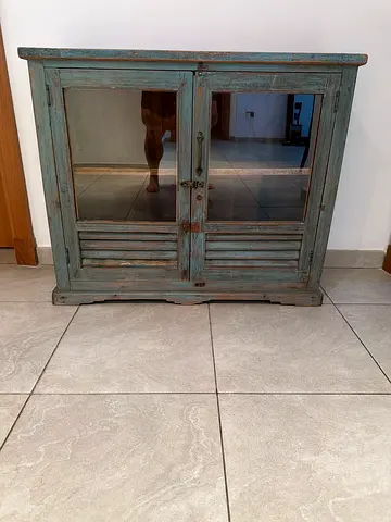 Vintage distressed blue wooden cabinet with glass doors. Quick sale. Can store books