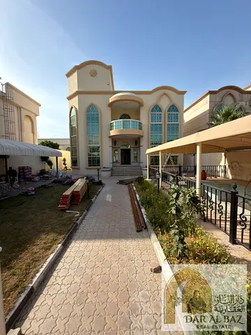 Luxury villa for annual rent in Sharqan – Sharjah | 4 master bedrooms | Indoor swimming pool | Large roof terrace | Modern design | Covered parking