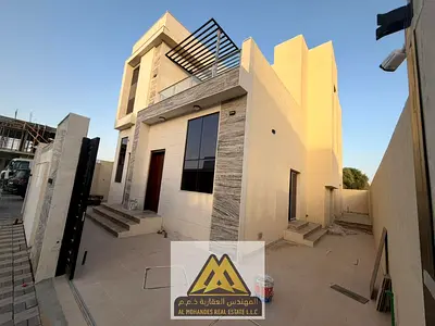 Luxury 4 Master BR Corner Stone-Front Villa with Rooftop & Maid's Room for Sale in Al Helio 2, Ajman